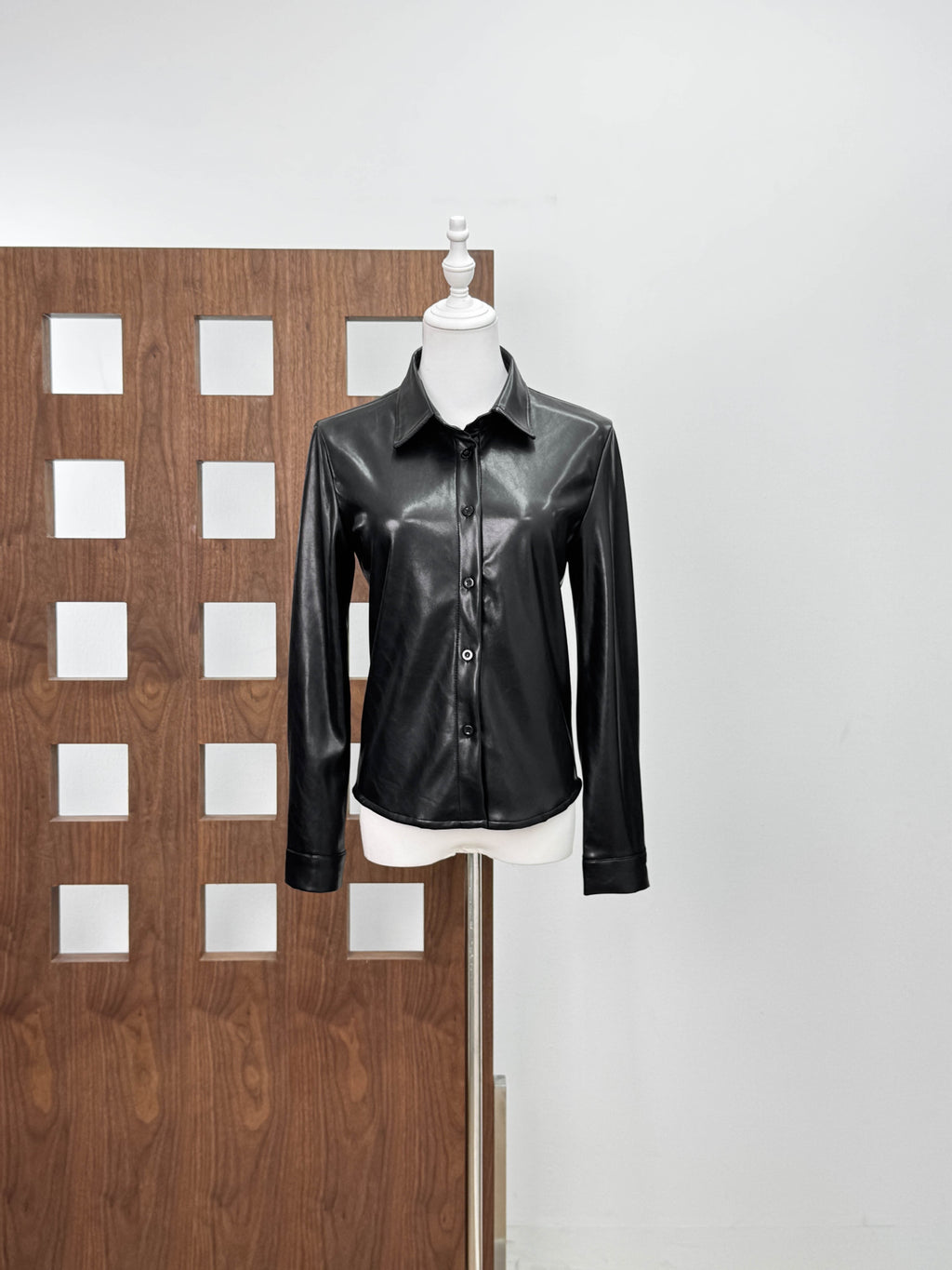 Two piece set of slim fit leather jacket and half skirt