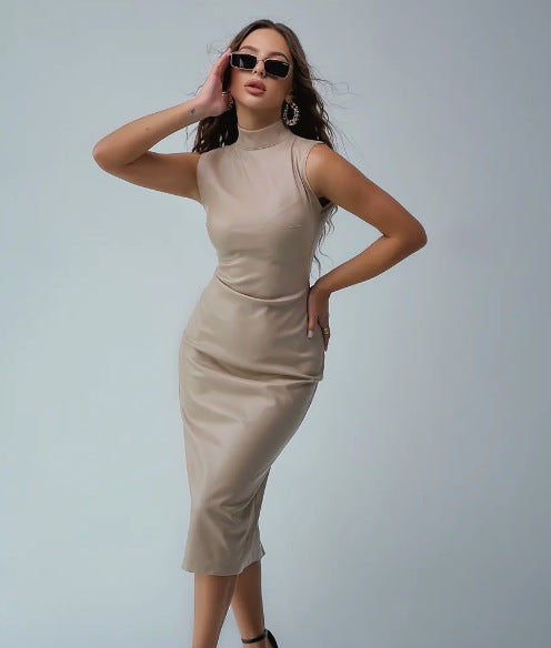 High neck sleeveless waist cinched PU leather skirt