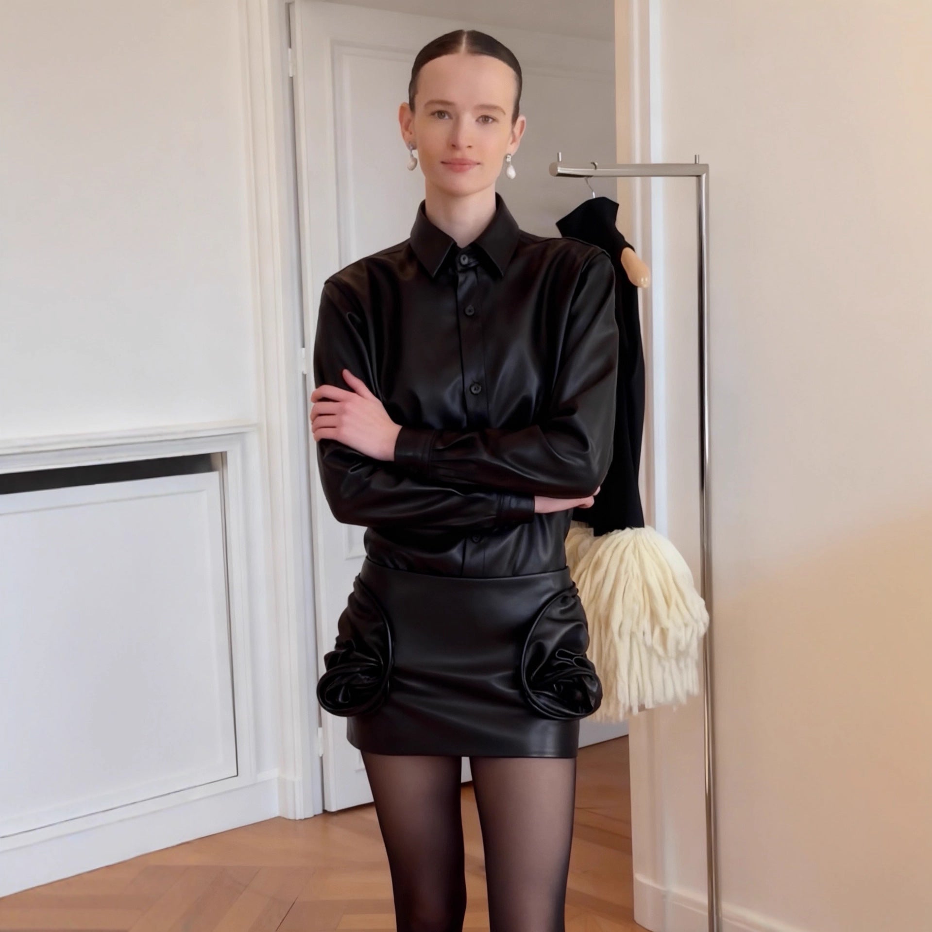 Two piece set of slim fit leather jacket and half skirt