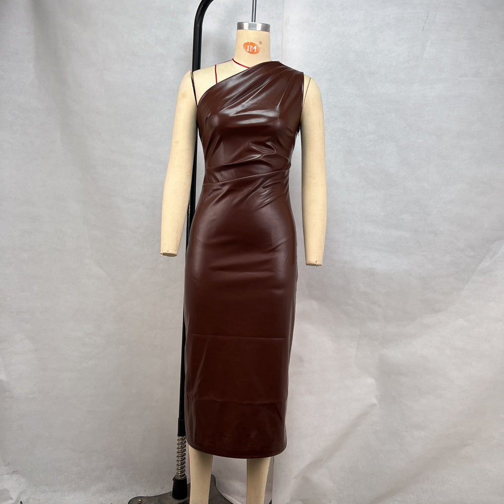 Tight fitting chest hugging sloping shoulder PU leather dress